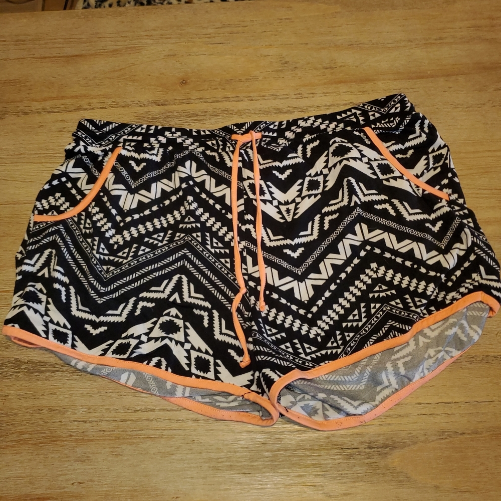 Orange white and black shorts